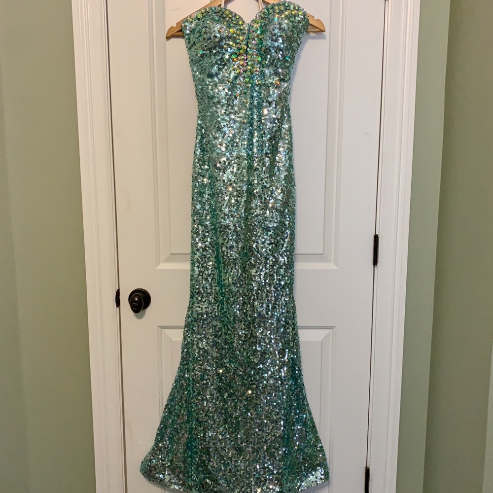Tony Bowls Le Gala turquoise sequined dress